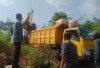  Bersihkan Tumpukan Sampah: Desa Taba Mulan Merigi Turunkan Alat Berat